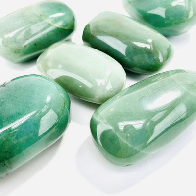 Green Aventurine Large Tumbled Stones - close up on a table