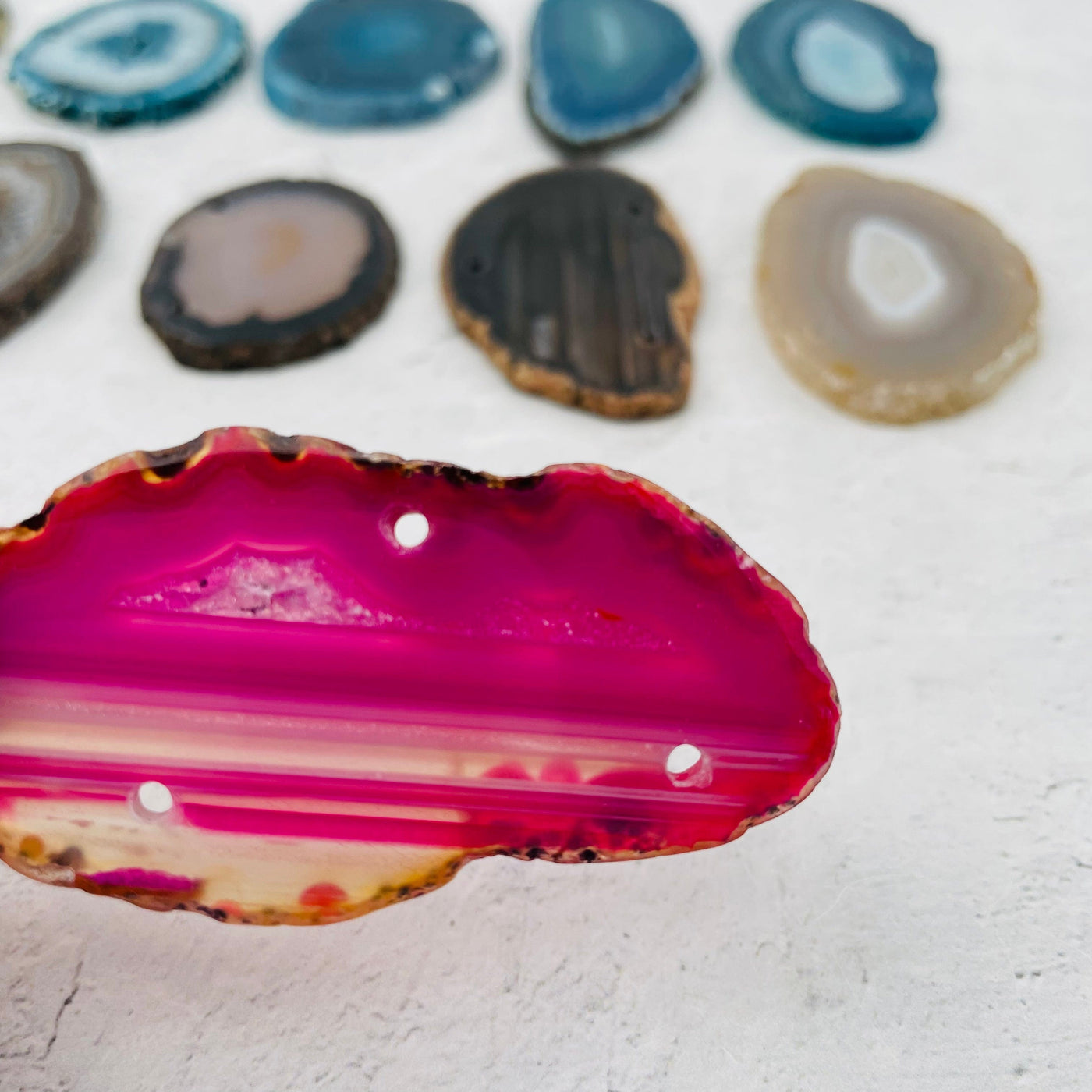 close up of the drilled agate slices 