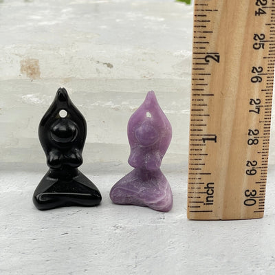 Gemstone Yoga Goddess next to a ruler for size reference 