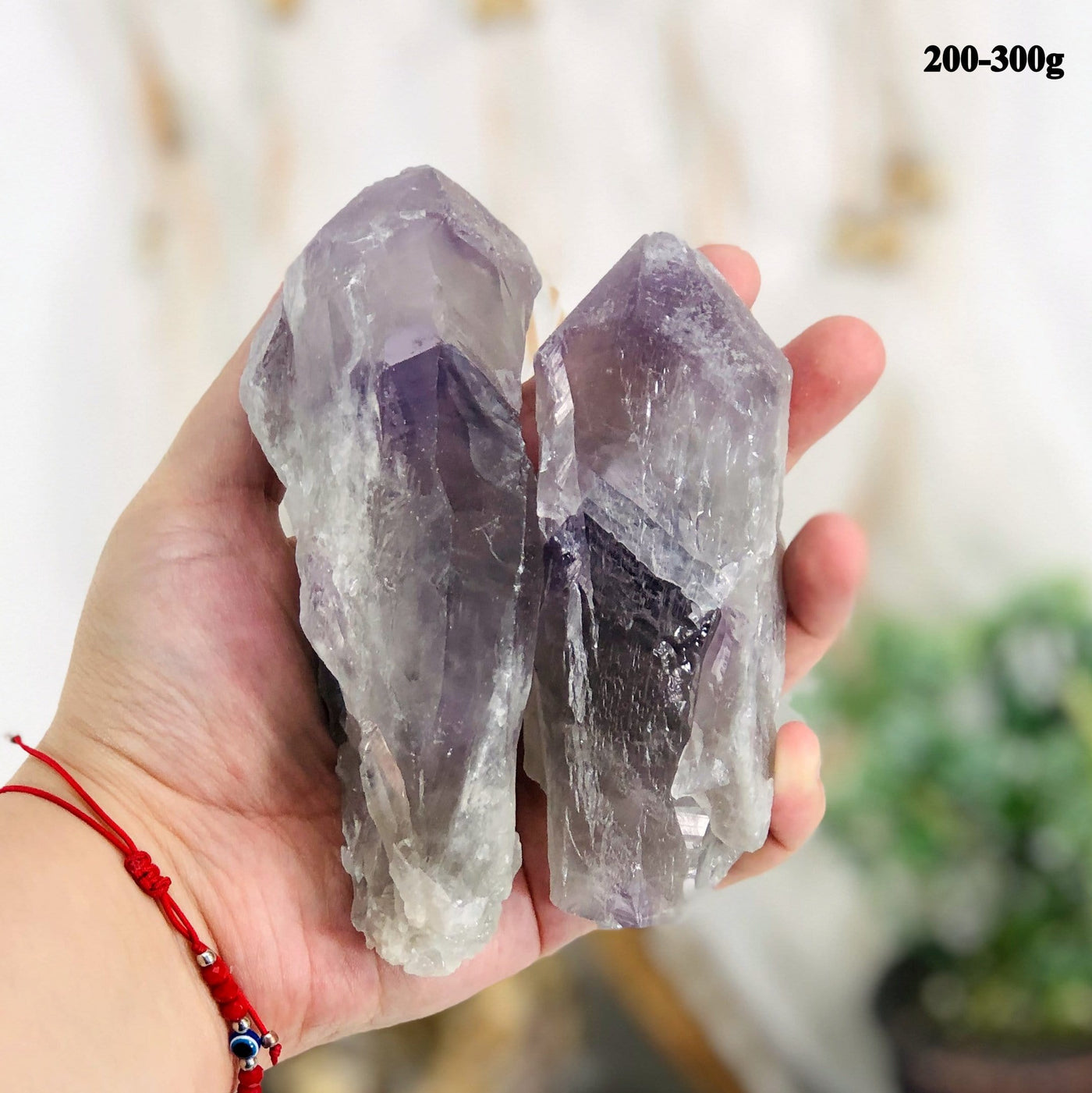 amethyst points in a hand