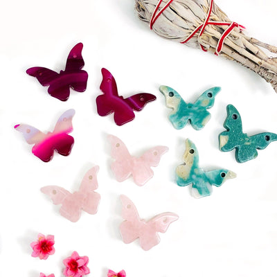 various pink dyed agate rose quartz and teal displayed to show color pattern formations