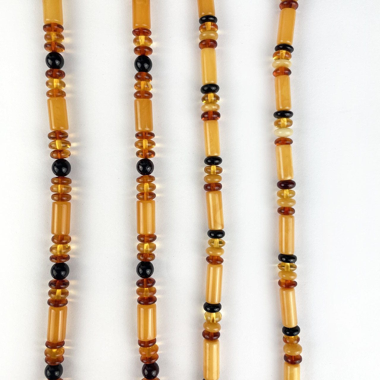 Amber Beaded Necklace with Assorted size and color of Beads up close to see detail
