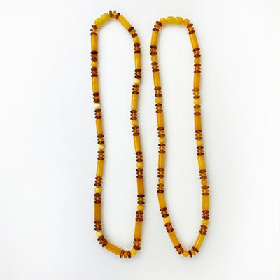 2 Amber Beaded Necklace with Assorted Beads side by side