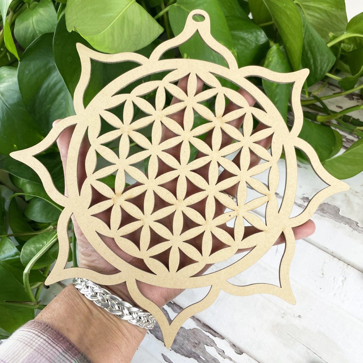 Crystal Grid - Flower of Life and Lotus Design in a hand for sizing