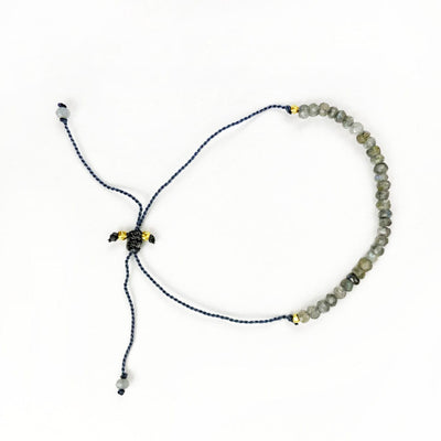 a labradorite bracelet showing cord and knot on back 