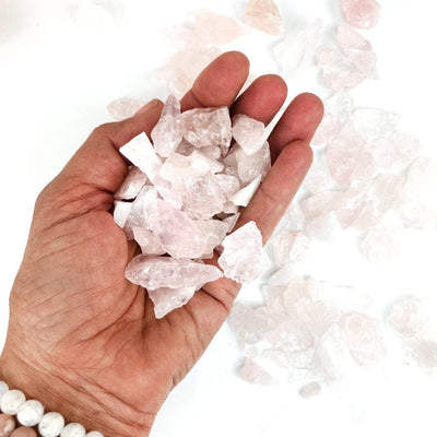 Rose Quartz Stones in a hand for size