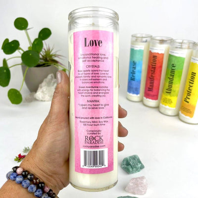 back of the candle has an information label with candle type, crystals within, and a mantra 