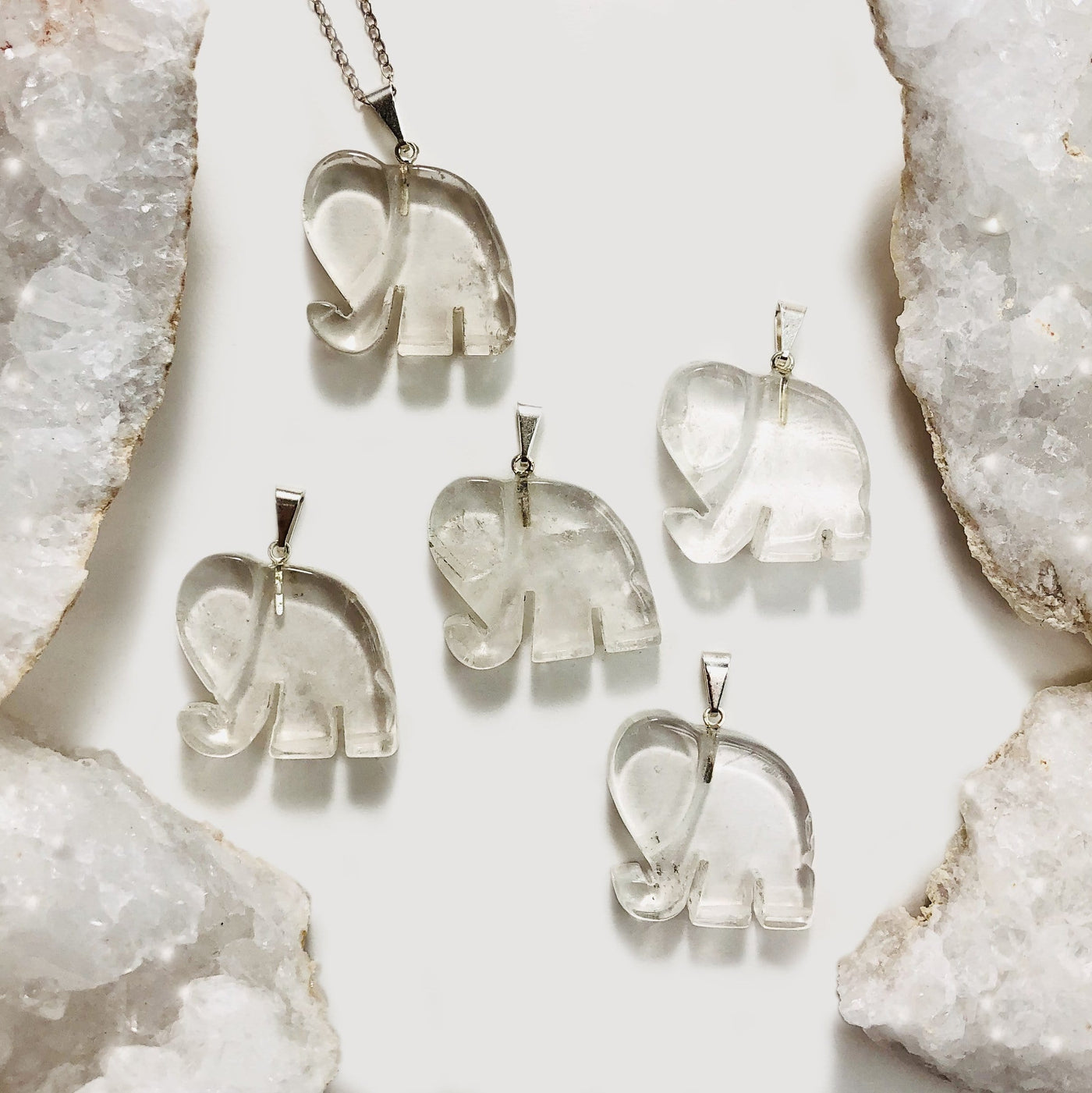 Elephant Gemstones Pendant Showing on Clear Cristal Stone On a white background