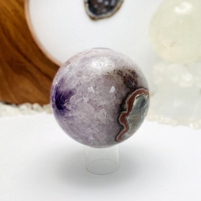 side shot view of the agate amethyst druzy sphere.