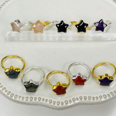 multiple rings displayed to show the differences in the gemstone types 