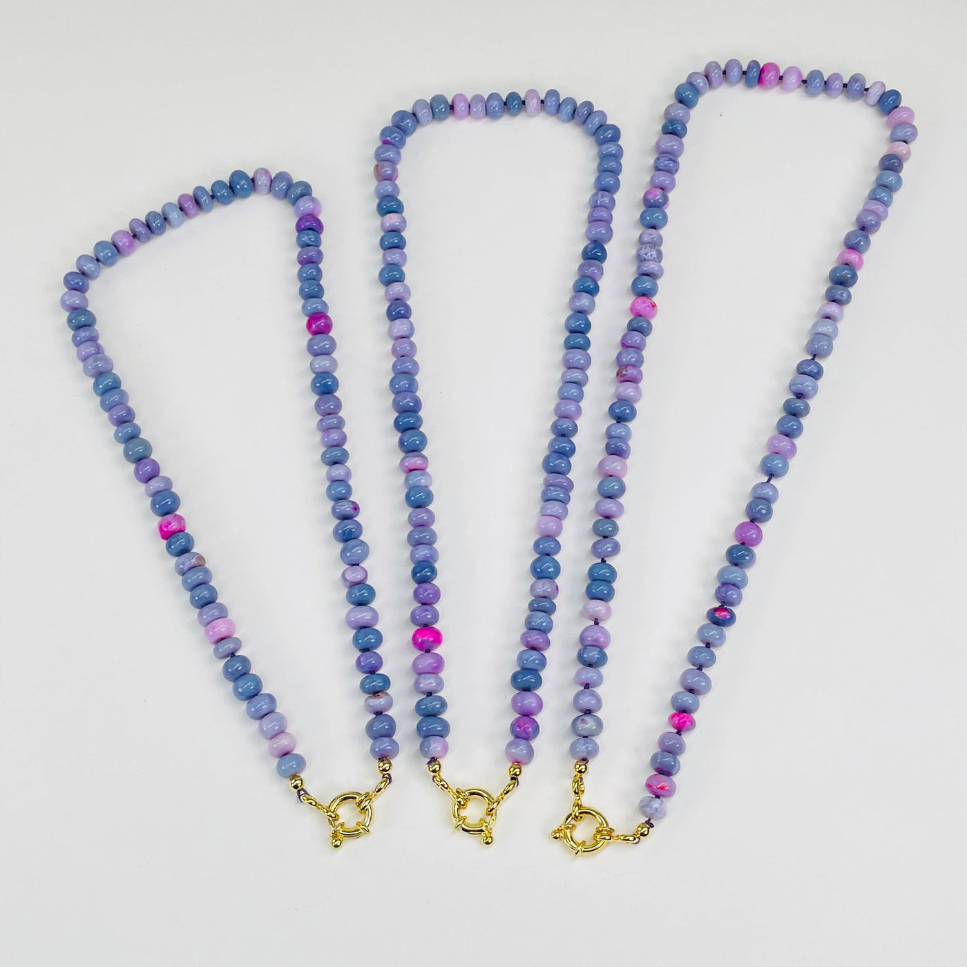 necklaces displayed to show the differences in the color shades 