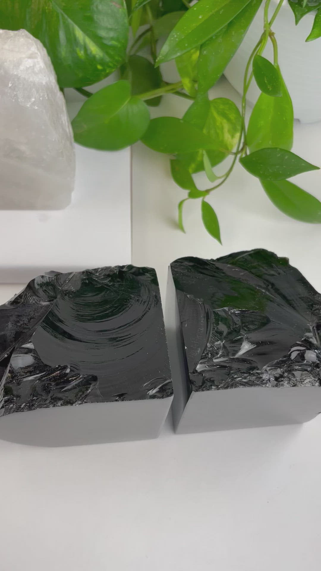 video of sodalite black obsidian white quartz rose quartz bookends up close 