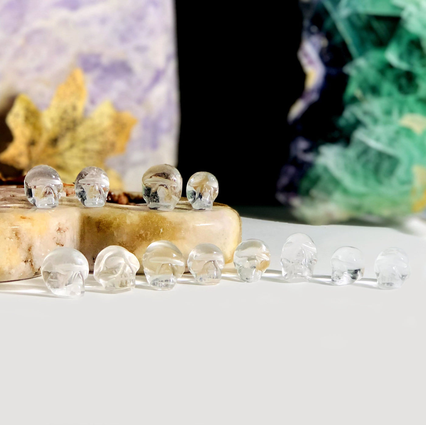 many crystal quartz skulls on display for possible variations