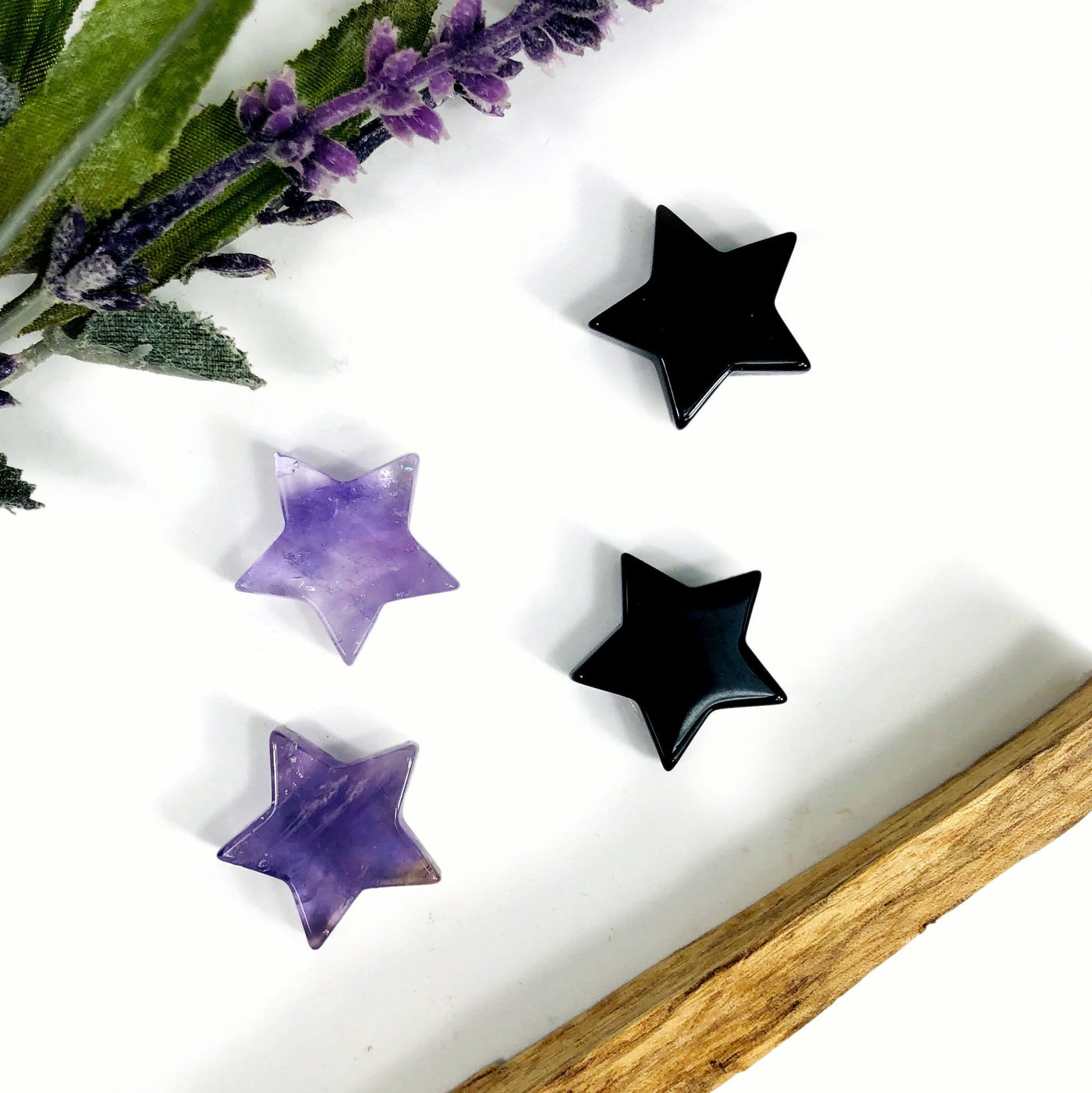 4 Star Gemstone Cabochons displayed on white surface