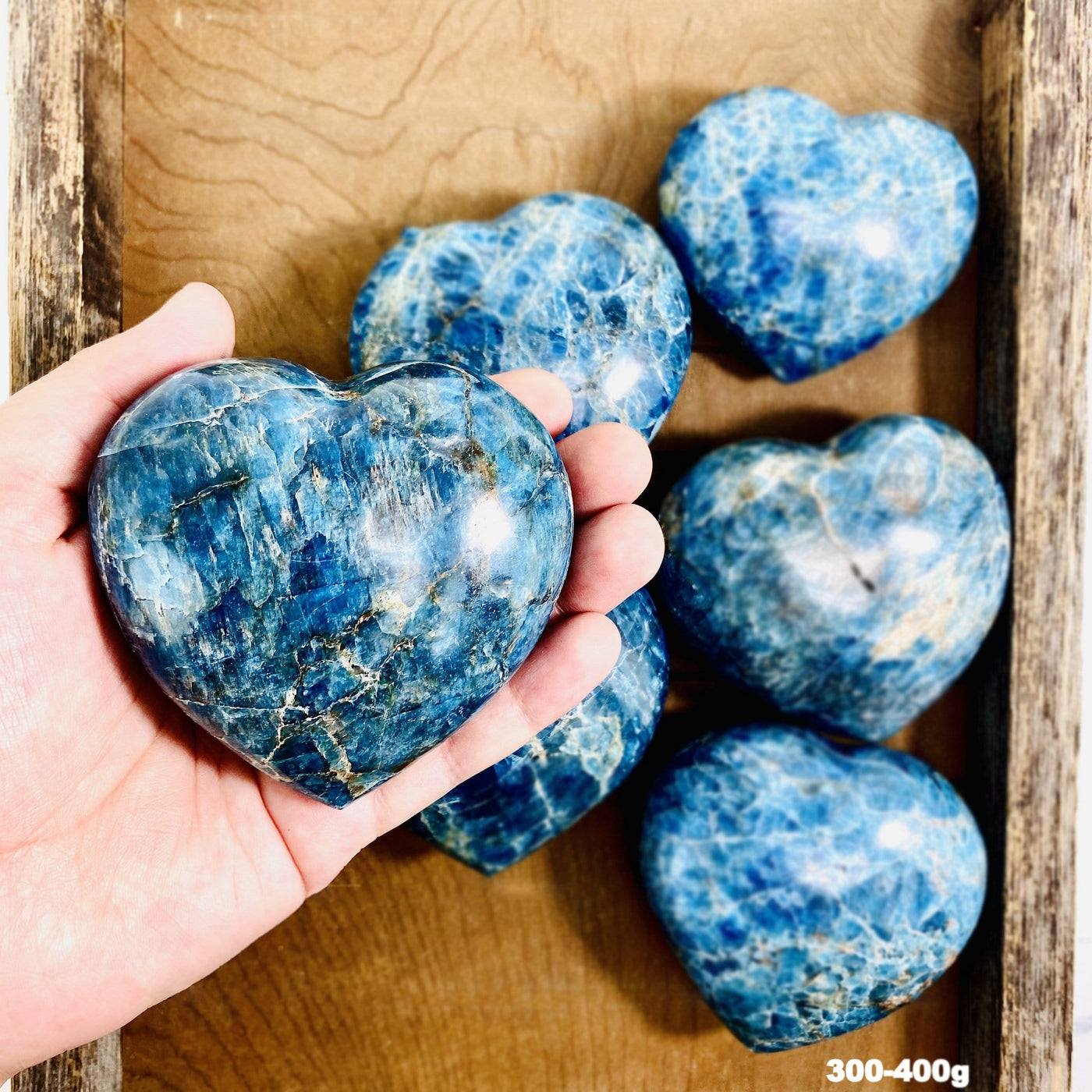 Blue Apatite Polished Hearts in hand by weight 300-400g