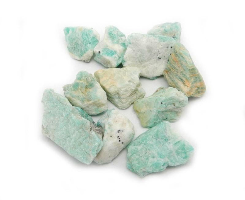 amazonite Chips being displayed on a white background.