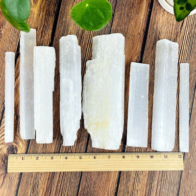 selenite bars with ruler for approximate size reference