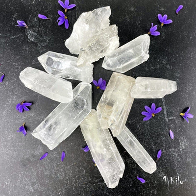 1 Kilogram Bag Crystal Point Grade A on a table showing sample of stock available