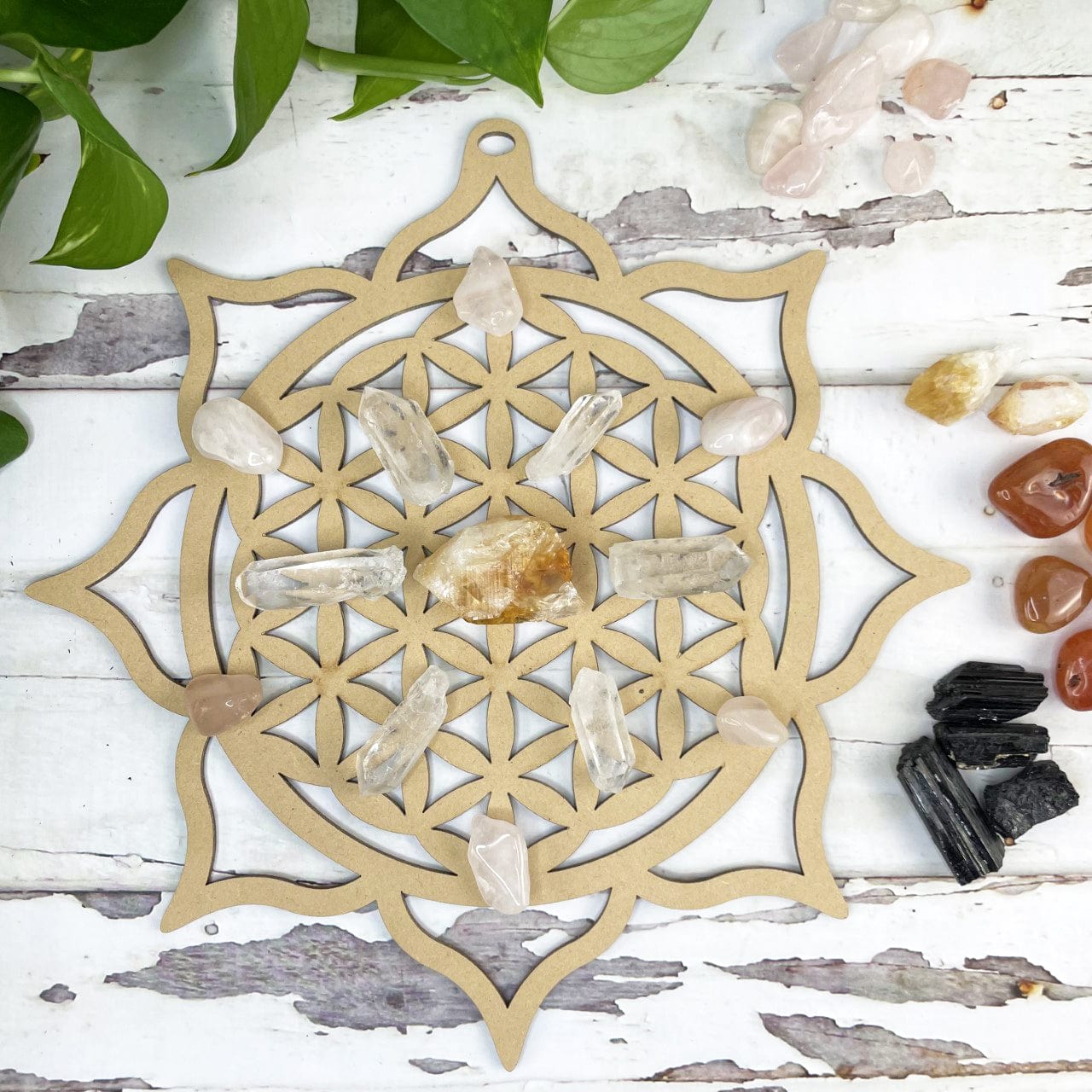 Crystal Grid - Flower of Life and Lotus Design with crystals placed on it