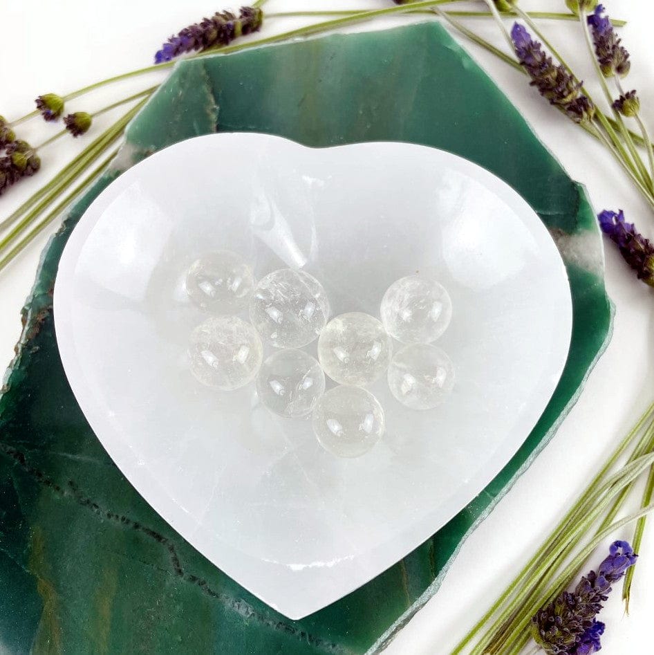 close up of selenite heart bowl for details