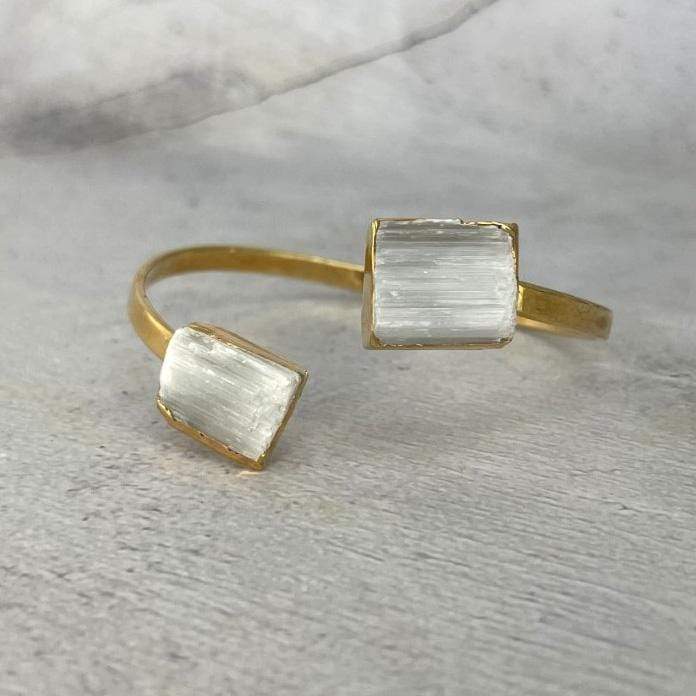 close up of gold selenite cuff bracelet for details