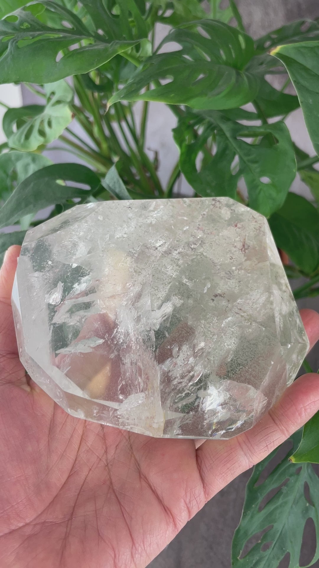 Crystal Quartz Polished Stone video showing all sides and some rainbows