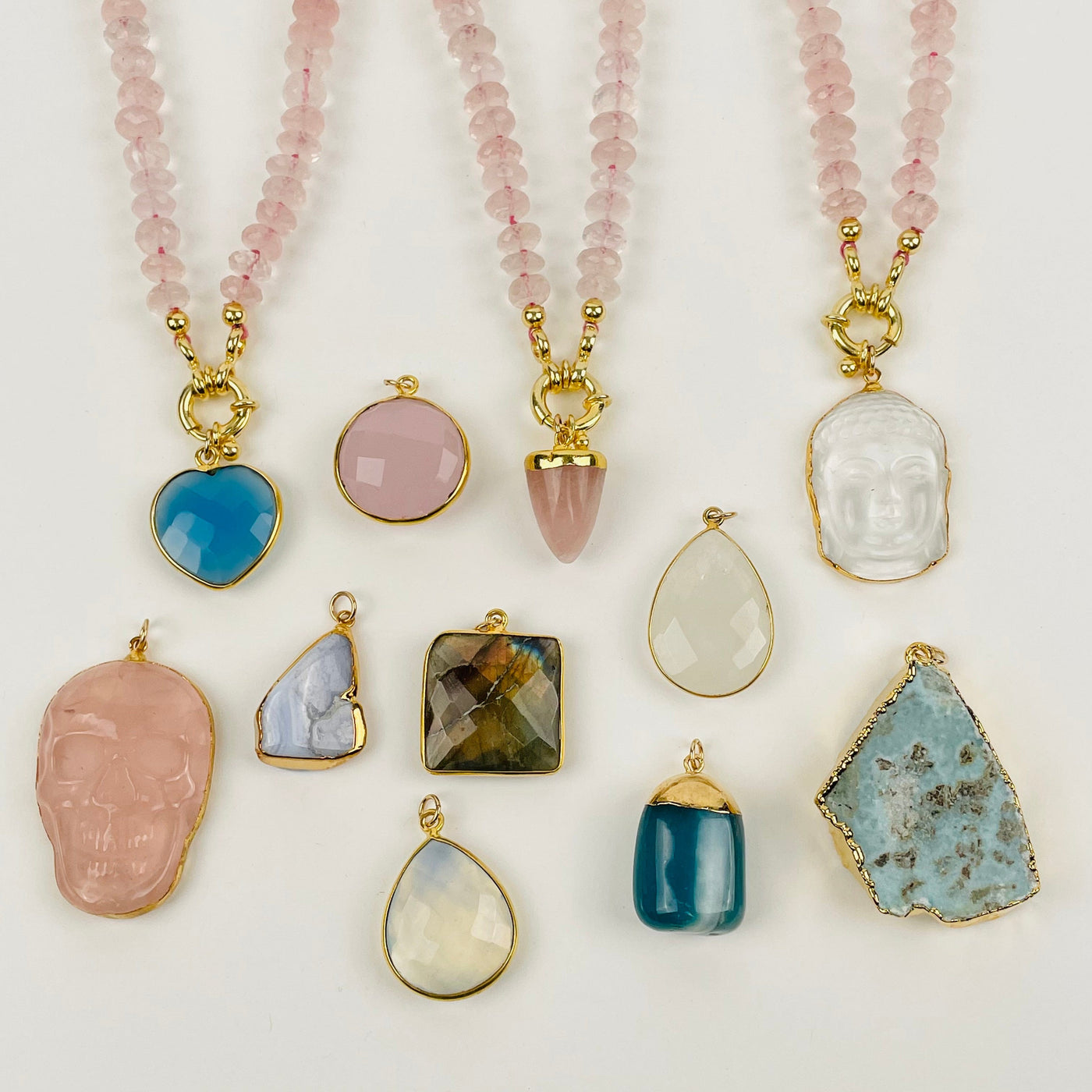 pendants displayed with the rose quartz necklace 