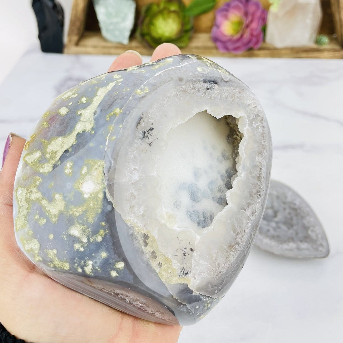 Close up of Agate Geode Box in a hand.