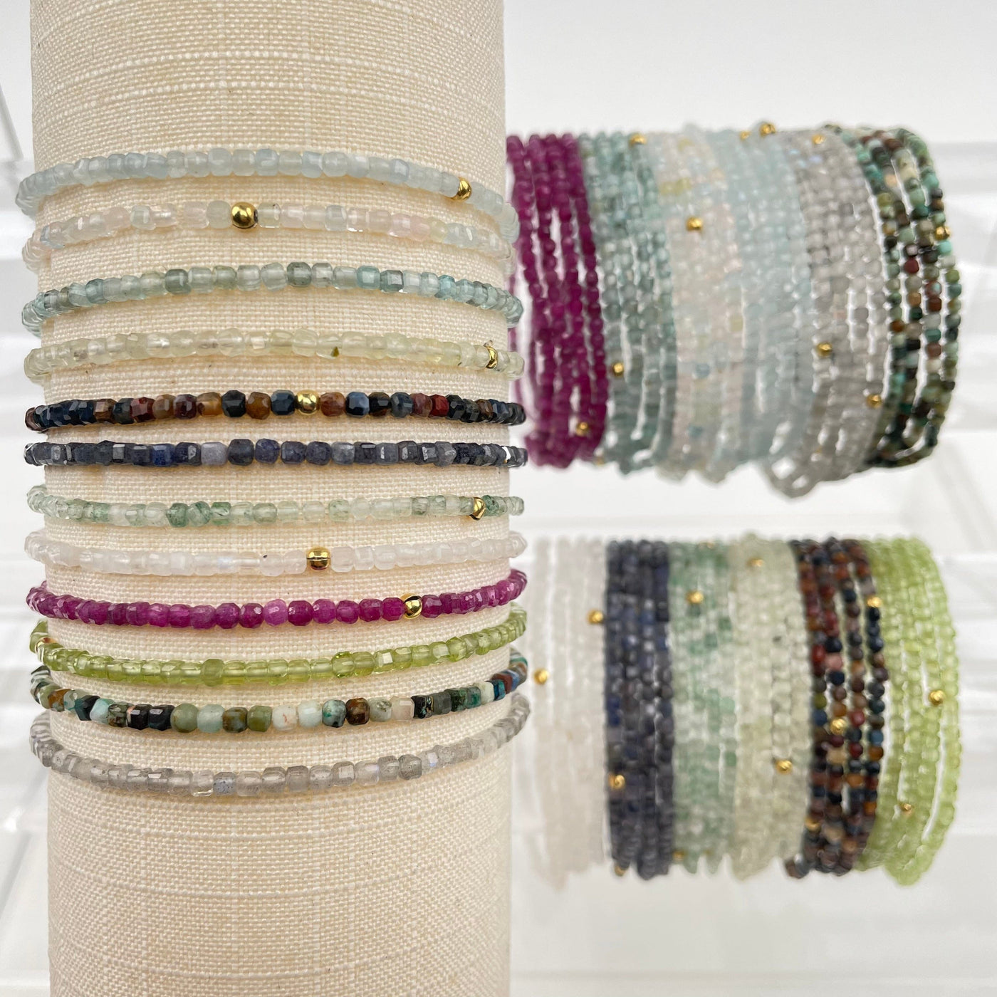 close up of the details on the gemstone bracelets 
