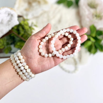 moonstone bracelet - 3 on a wrist and 2 in a hand