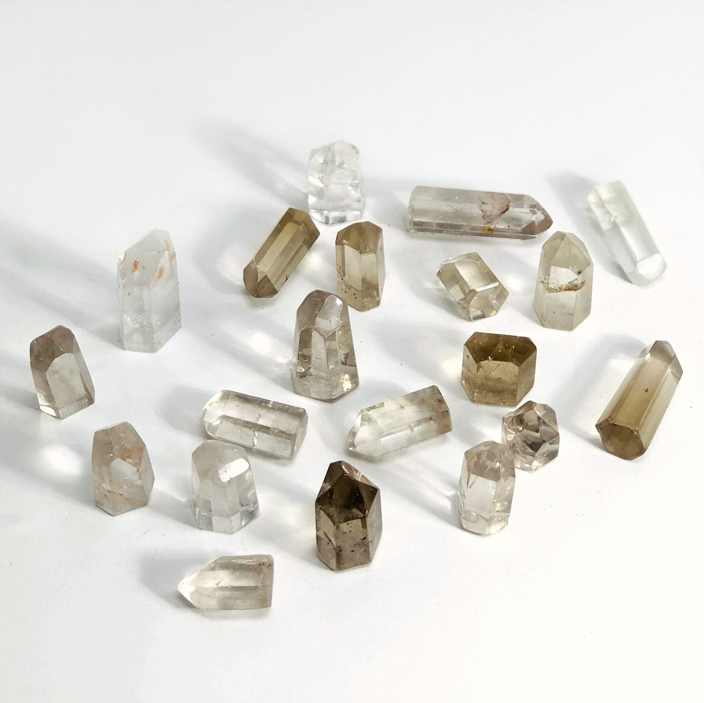Crystal Quartz Polished Points spread out showing range of stock available