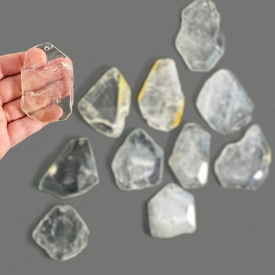 Crystal Quartz Drilled Pendants - in a hand