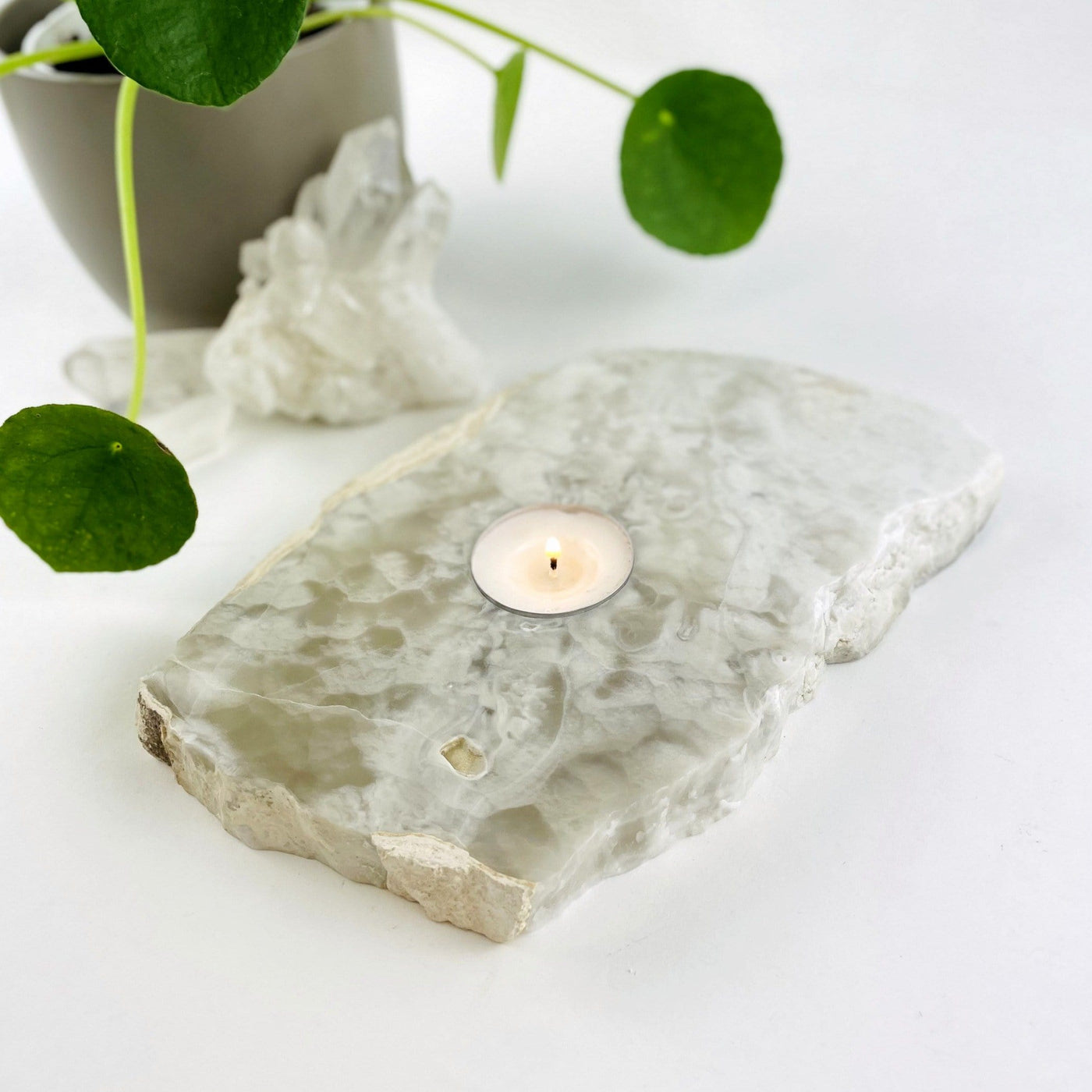 Grey Aragonite  Candle Holder shown from side to reference thickness