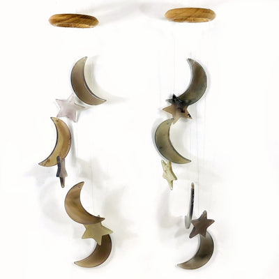 Two Agate Moon and Star Wind Chimes shown hung with a white background.