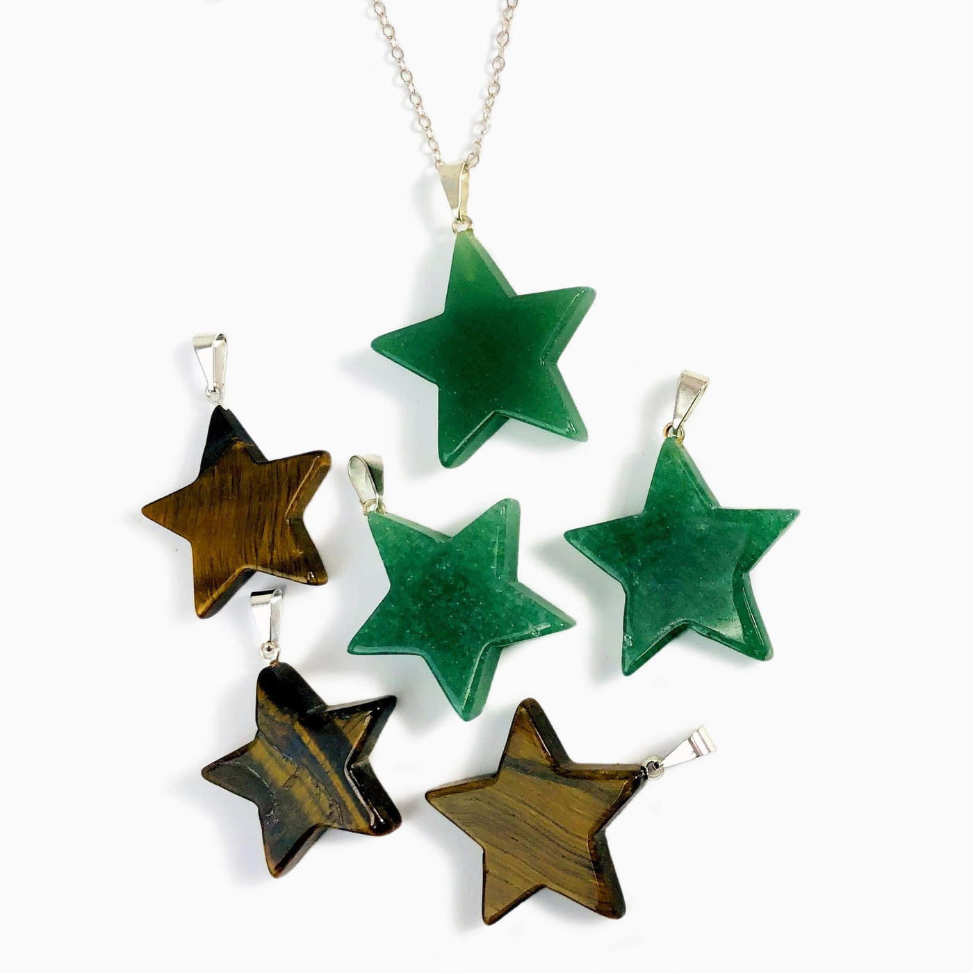 star pendants available in tigers eye and green quartz 