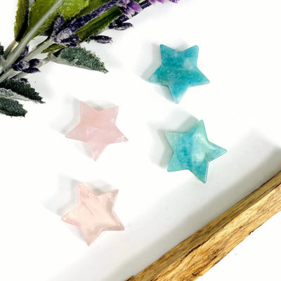 4 Star Gemstone Cabochons displayed on white surface