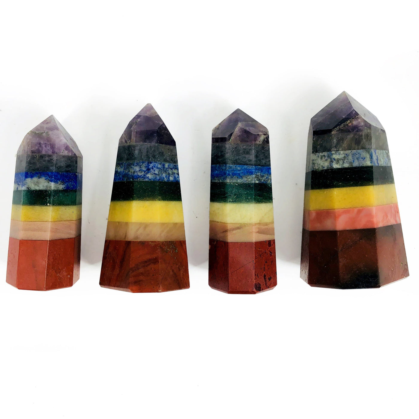 four seven chakra towers on display for possible variations