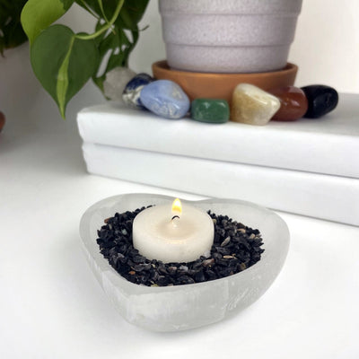 Black Onyx  Tiny Chips in a bowl with a candle