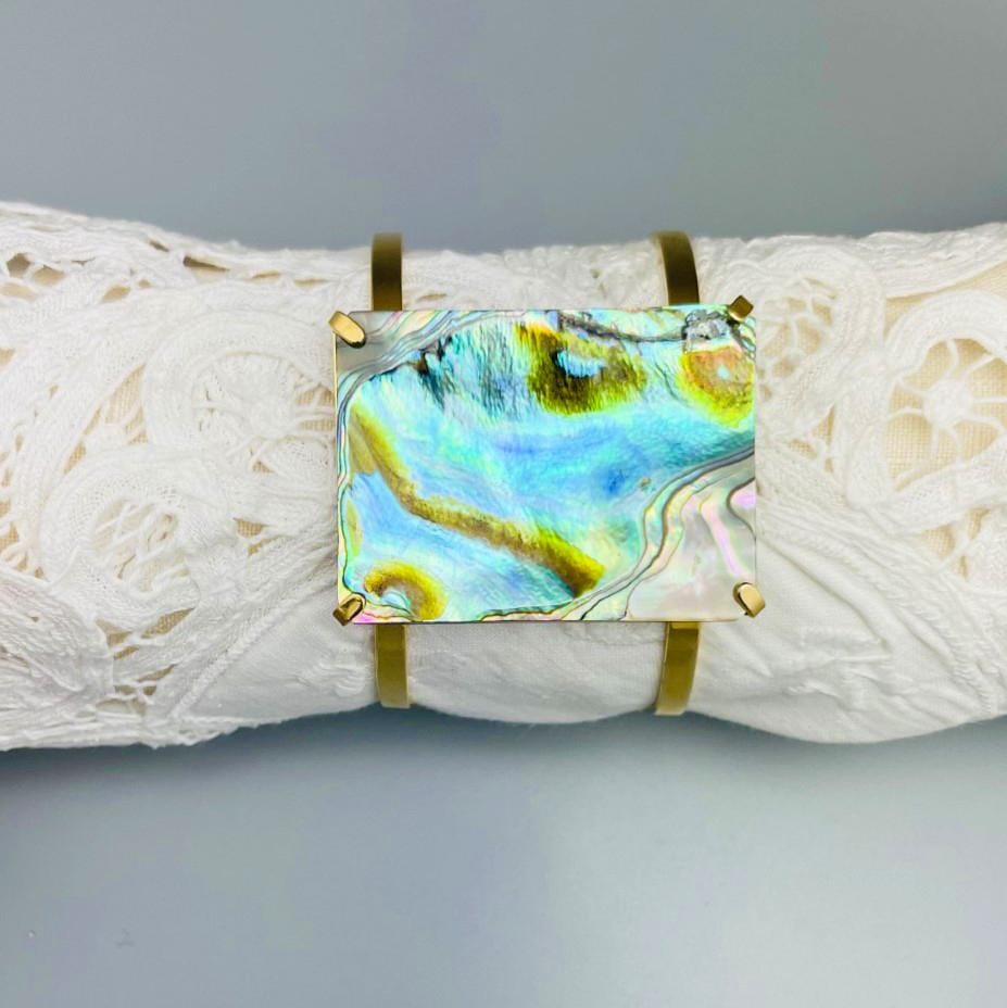 1 Abalone Geometric Cuff in Gold Electroplate displaying the frontside.