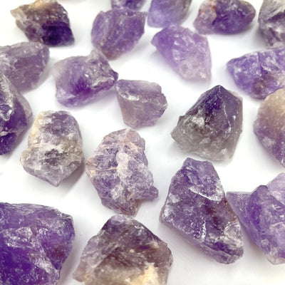 Amethyst Natural Stones laid out on a table