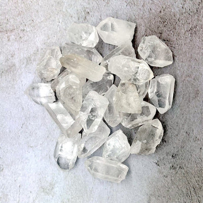 Crystal Quartz Natural Stone points in a pile