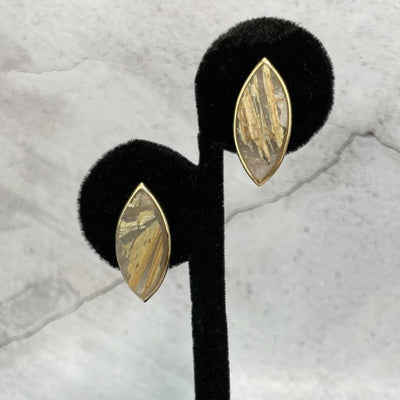 Rutilated Quartz Stud Earrings on earring stand