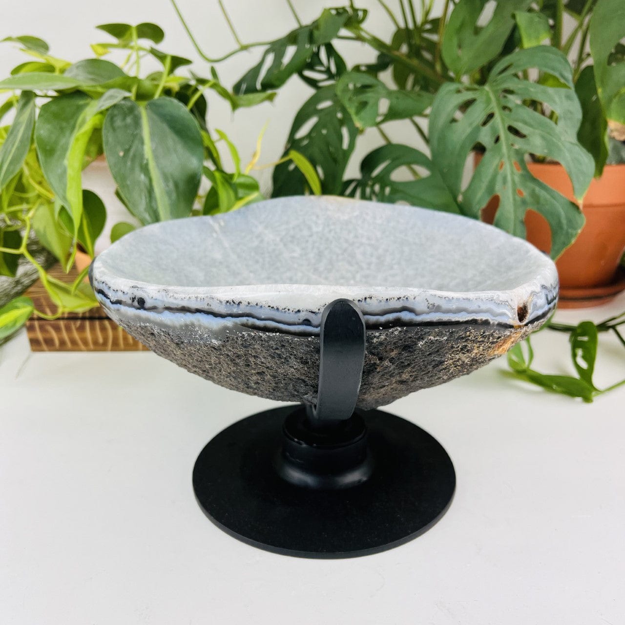 Polished Agate Dish on Metal Spinning Base on display showing side view