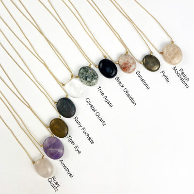all the worry stone necklaces with the stone name next to them for identification