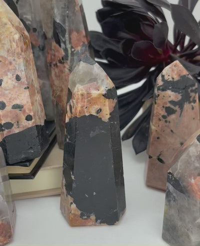 black tourmaline with feldspar polished point video showing the details of the points in color size and characteristics