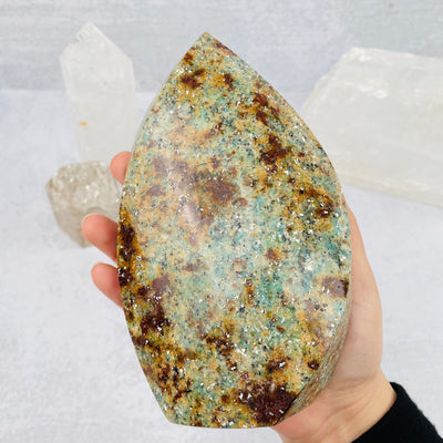 Amazonite Polished Flame tower in hand for size reference 