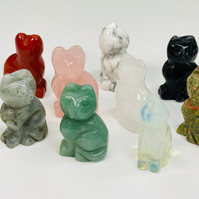 cat shaped gemstones displayed in different angles to show the front, side and back