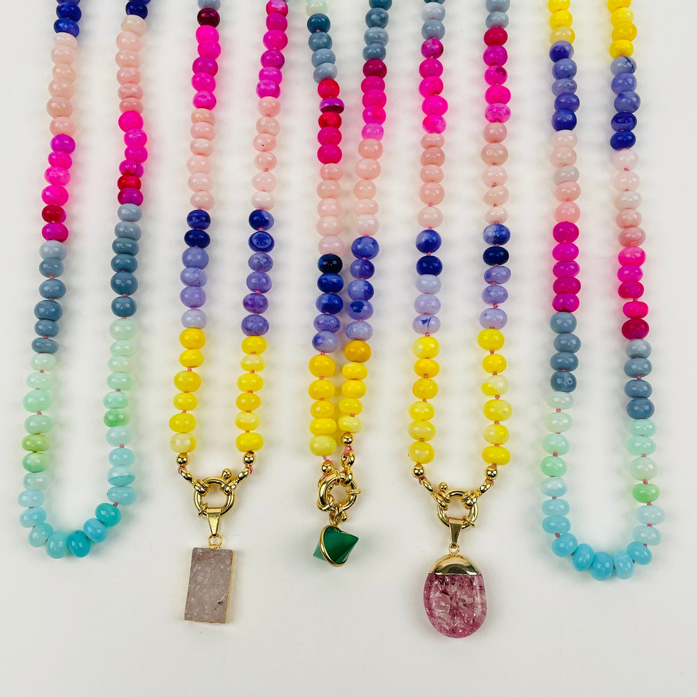 necklaces displayed with candy charms 