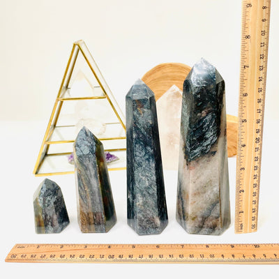 hematite points next to a ruler for size reference 