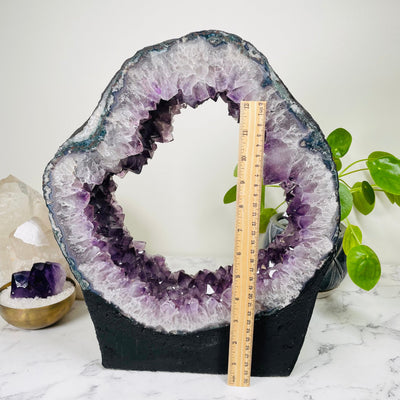 amethyst portal next to a ruler for size reference 